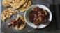 Shredded duck with plums and chilli flatbread 