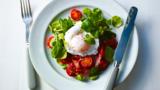 Fried bacon with poached egg and tomatoes