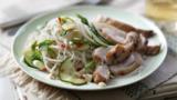 Spicy chicken thighs with cucumber and cashew salad