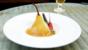Pears poached in cardamom, cinnamon and chilli syrup with salted caramel sauce
